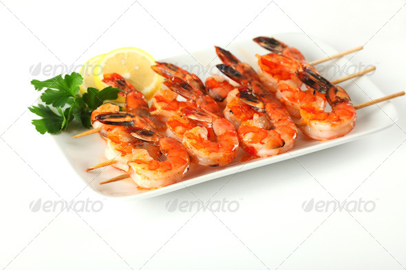 Shrimp skewers with sweet garlic chili sauce on white background