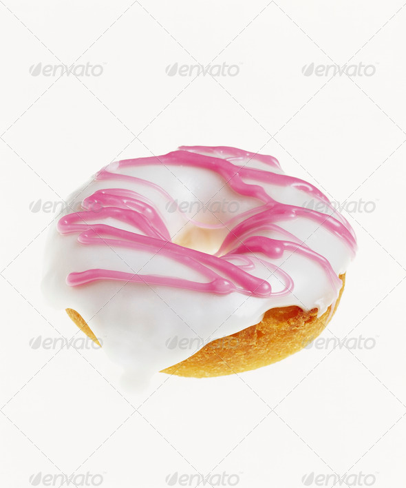 Donut with White and Pink Icing - Stock Photo - Images