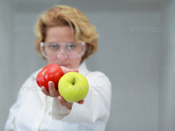 Female Scientist Offering Natural Food - Stock Photo - Images
