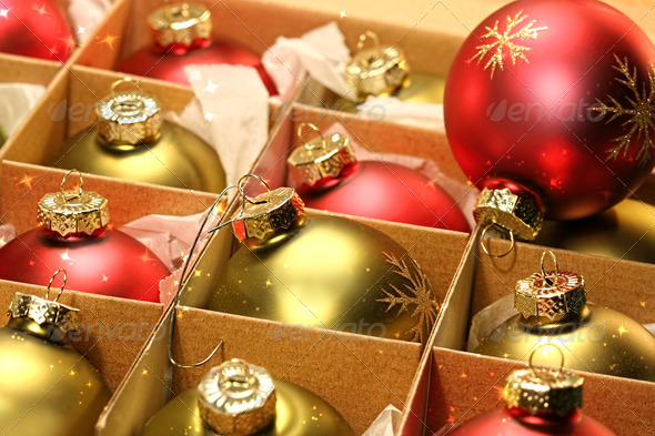 Christmas balls in box with paper wrapping - Stock Photo - Images