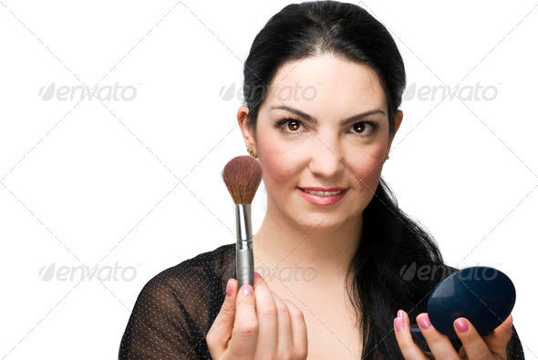 Woman with brush for blush and mirror - Stock Photo - Images