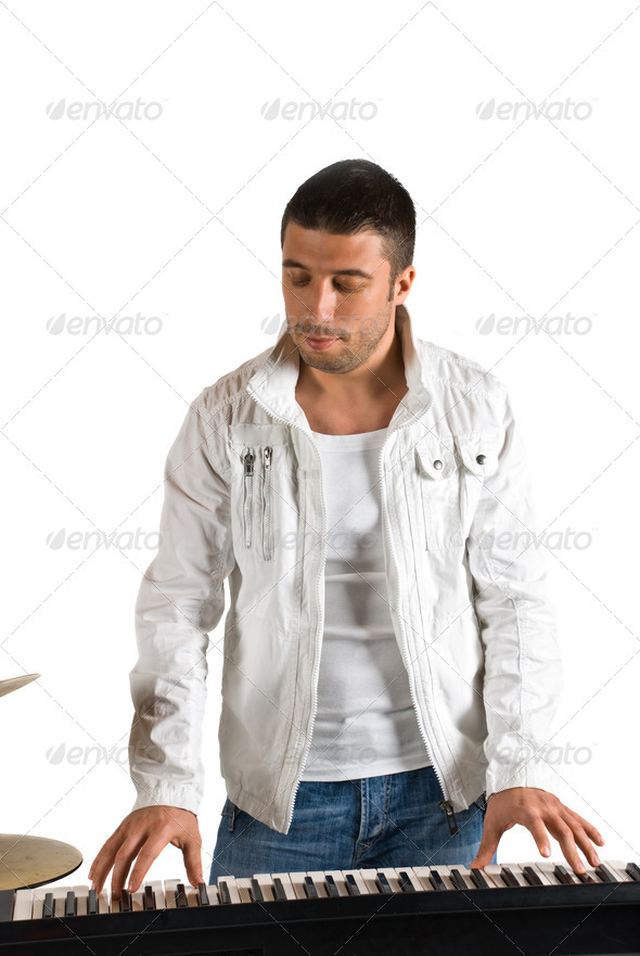 Man playing electronic organ - Stock Photo - Images