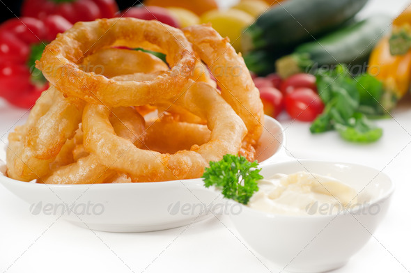 golden deep fried onion rings - Stock Photo - Images
