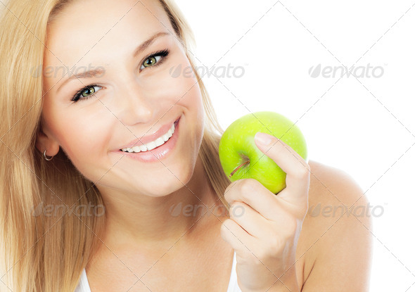 Pretty girl eating apple - Stock Photo - Images