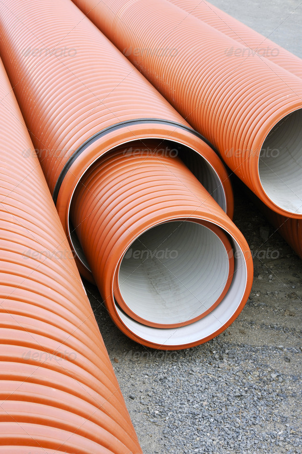 Plastic drainage pipes stacked - sewage conduit - Plumbing tubes