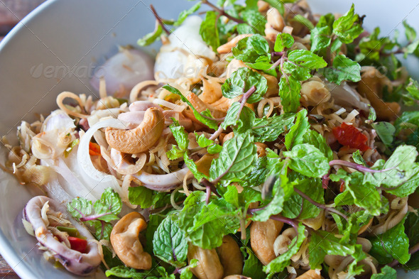 Thai dressed salad, mix of lemongrass and spice, close up - Stock Photo - Images