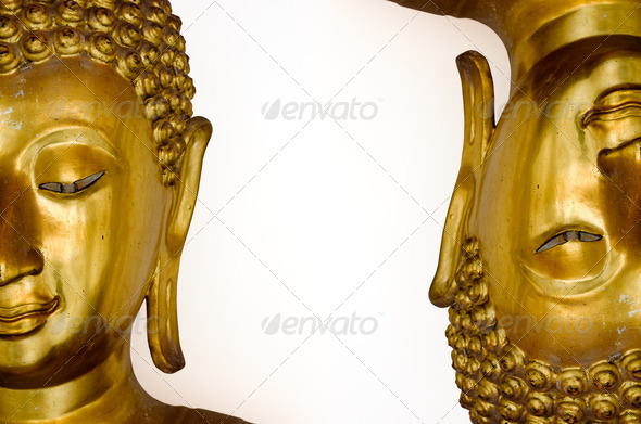 Two half face of gold buddha image - Stock Photo - Images