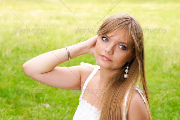 Beautiful young blond woman - Stock Photo - Images
