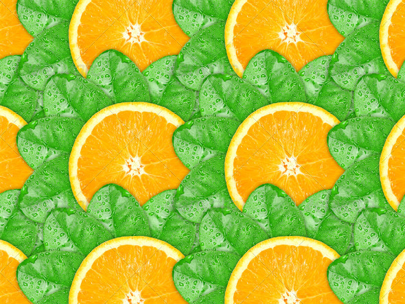Background of orange slices and green leaf - Stock Photo - Images