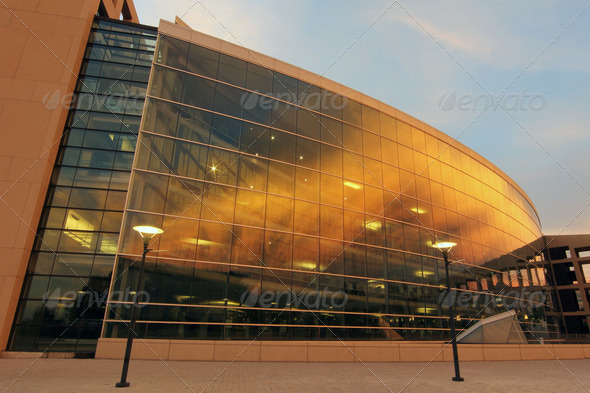 Curved Glass Building Sunset - Stock Photo - Images