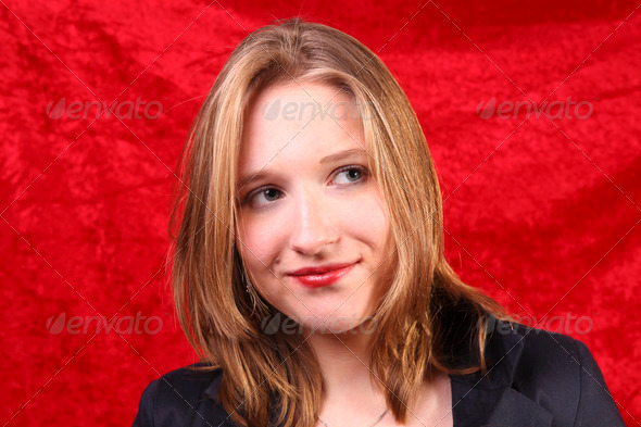 Portrait of a young woman with red velvet - Stock Photo - Images