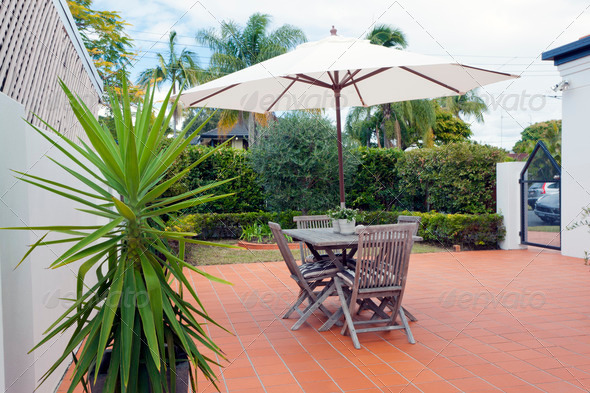 Modern backyard with table - Stock Photo - Images