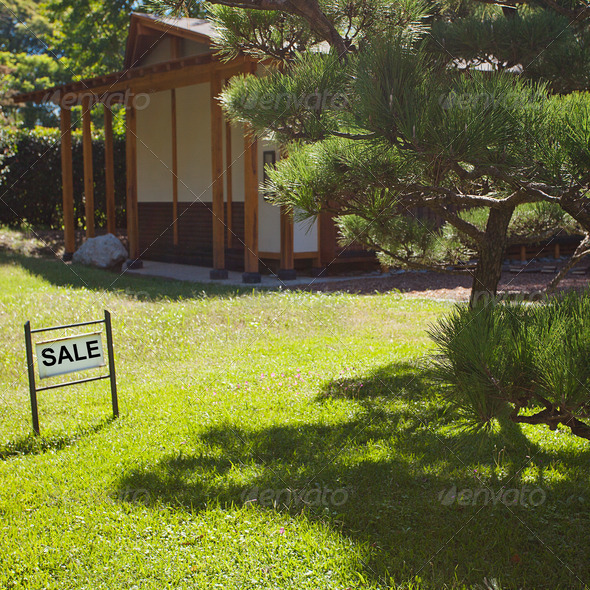 house in Japanese style on background of trees and card sale - Stock Photo - Images