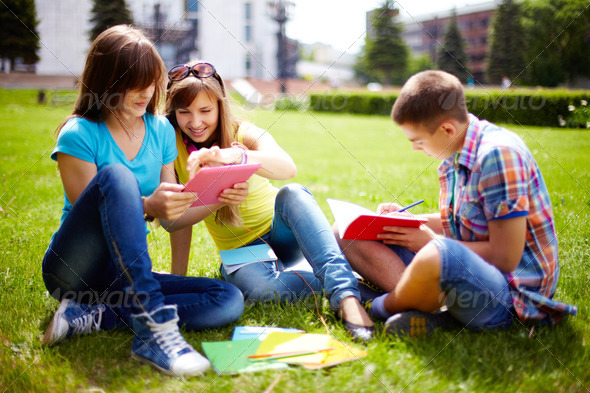 Homework outdoors - Stock Photo - Images