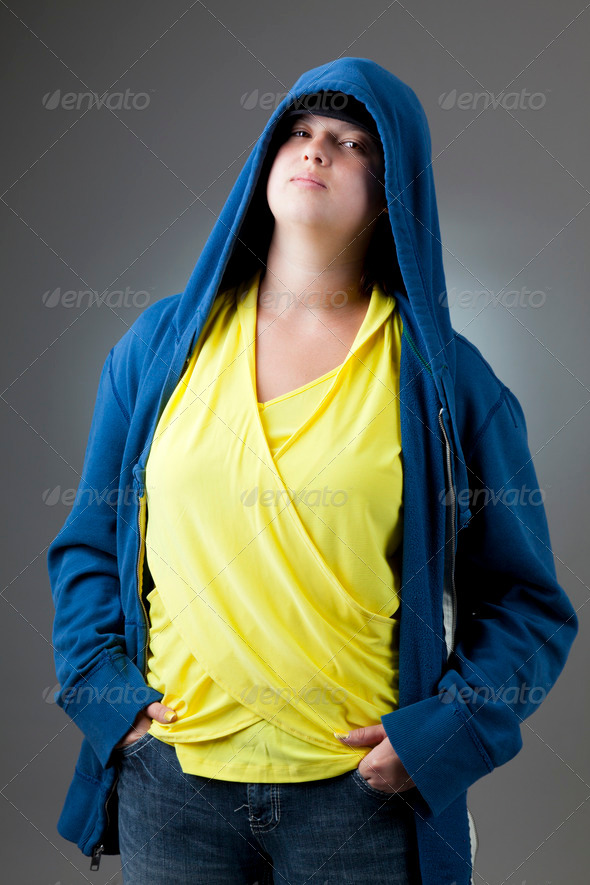 Girl in a hooded jacket - Stock Photo - Images