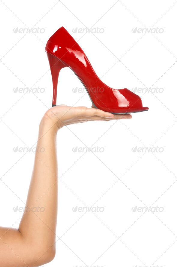 Holding Red Shoe - Stock Photo - Images