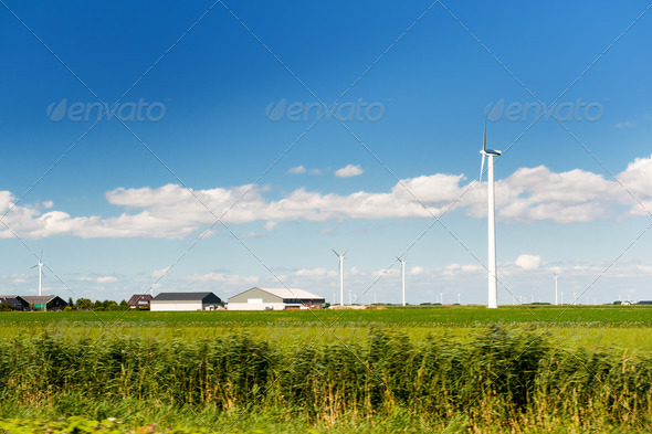 Wind turbines in agriculture landscape - Stock Photo - Images