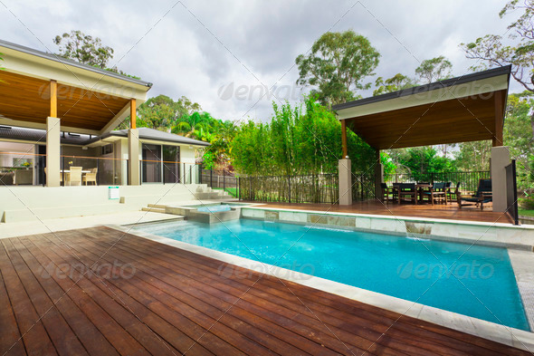 Modern backyard with pool - Stock Photo - Images