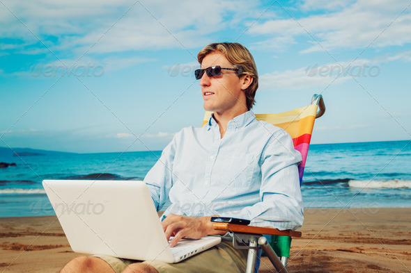 Business man on the beach - Stock Photo - Images