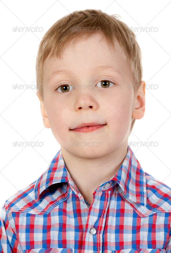 portrait of a boy in a plaid shirt - Stock Photo - Images