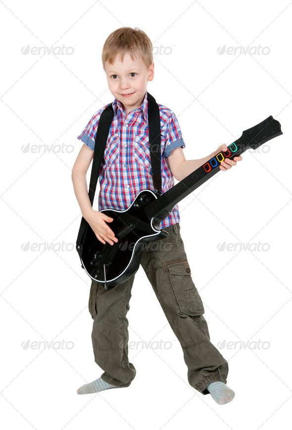 The boy with the electronic guitar - Stock Photo - Images