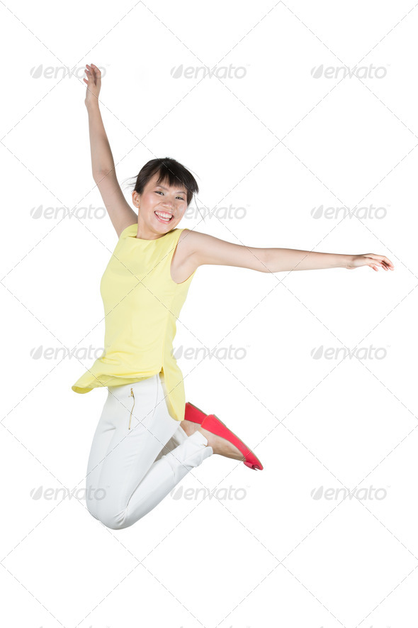 Happy woman jumping in air. - Stock Photo - Images