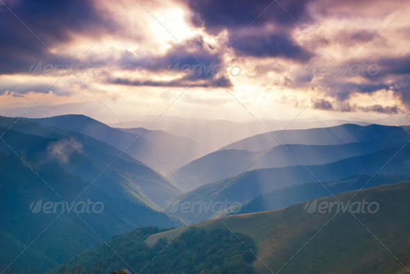 Mountains hills and sunbeams - Stock Photo - Images