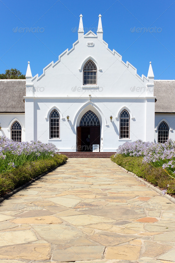 White Church in Franschhoek in front of blue sky - Stock Photo - Images