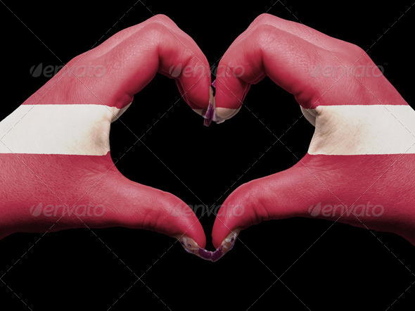 Heart and love gesture by hands colored in latvia flag for touri - Stock Photo - Images