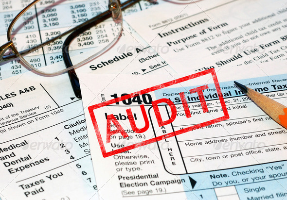 Federal tax forms with audit stamp
