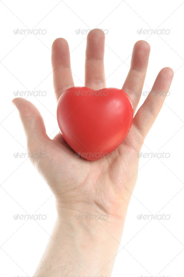 Man's Hand Holding a Red Heart - Stock Photo - Images