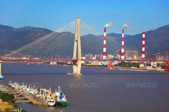 Cable-stayed bridge and boatyard - Stock Photo - Images