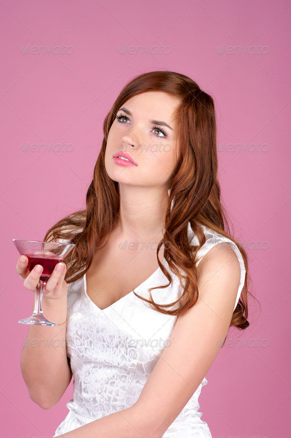 Beautiful young female in evening gown - Stock Photo - Images