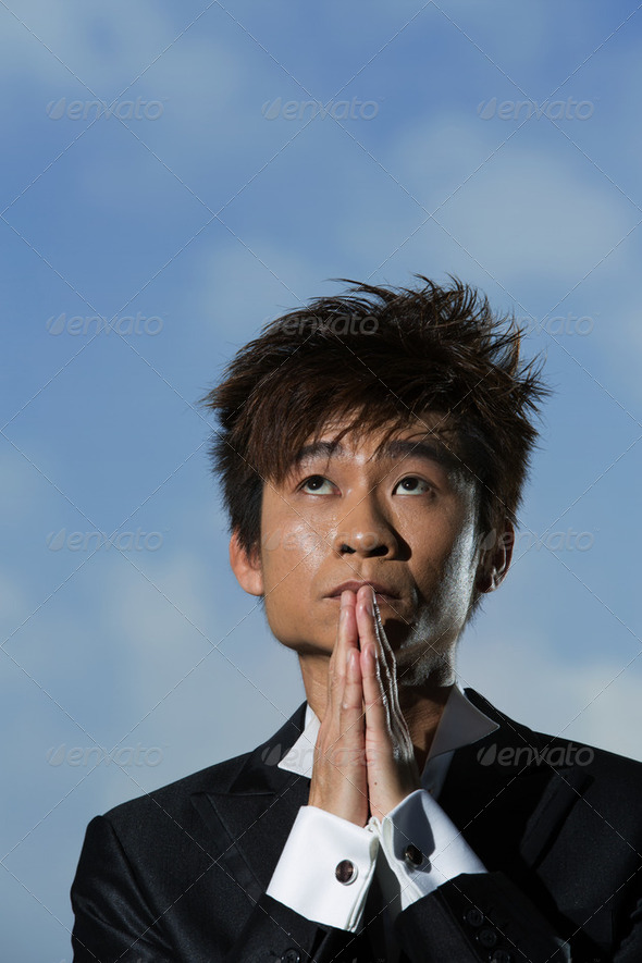fashionable Asian man wearing stylish suit - Stock Photo - Images