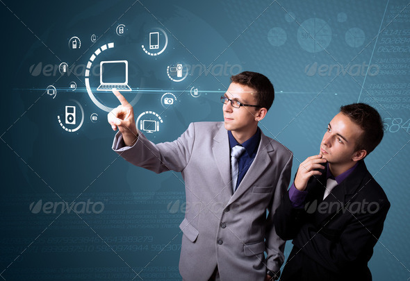 Businessman pressing virtual media type of buttons - Stock Photo - Images