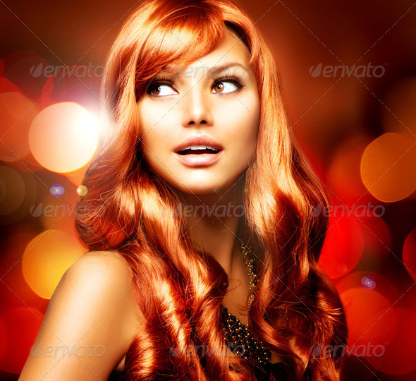 Beautiful Girl With Shiny Red Long Hair over Blinking Background - Stock Photo - Images