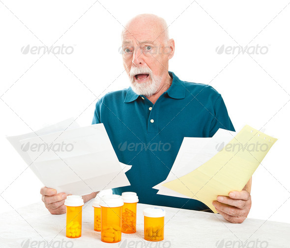 Senior Overwhelmed by Medical Costs - Stock Photo - Images
