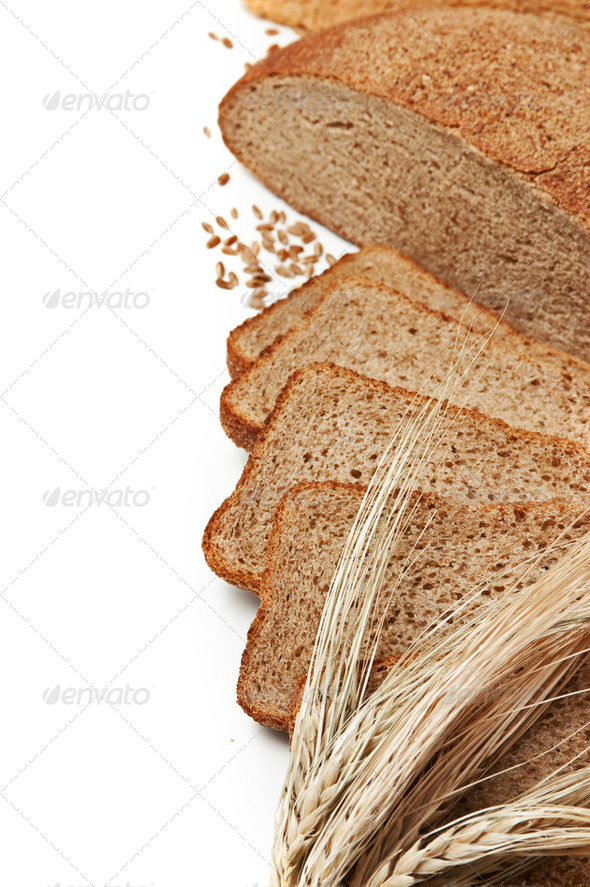 slices bread and ears of corn - Stock Photo - Images