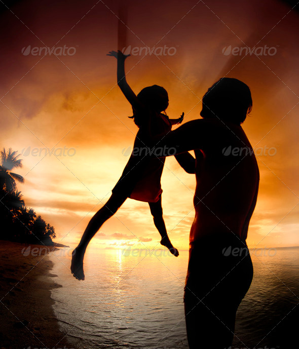 silhouette family of child hold on father - Stock Photo - Images