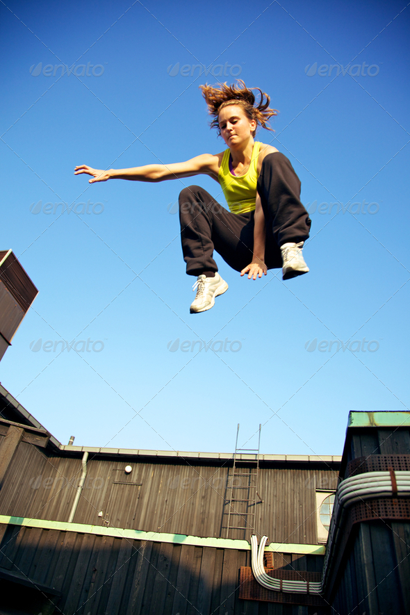 Traceur Demonstrating Parkour - Stock Photo - Images