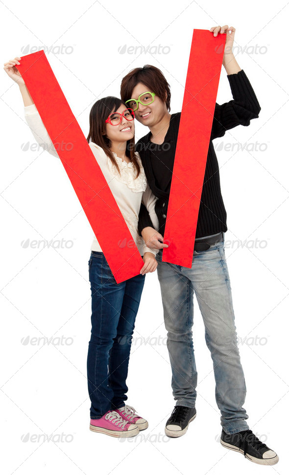 Happy Chinese new year. Young Asian couple holding blank spring festival couplets - Stock Photo - Images
