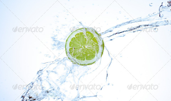 Fresh lime splashing underwater - Stock Photo - Images