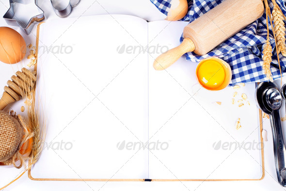 Open notebook and Basic baking ingredients - Stock Photo - Images