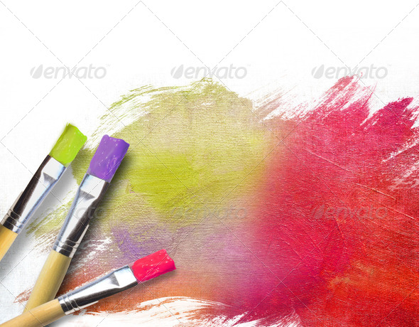 Artist brushes with a half finished painted canvas - Stock Photo - Images