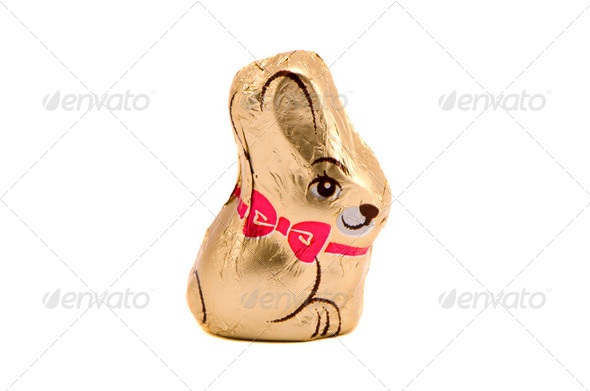 Isolated chocolate bunny Easter symbol on white - Stock Photo - Images