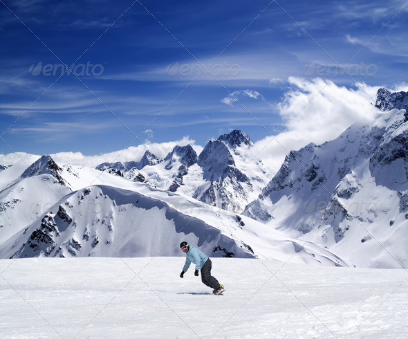 Young snowboarder on ski slope (Misc) Photo Download