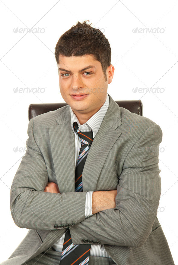 Young manager on chair - Stock Photo - Images