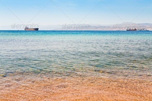 view on Israel mountain through Red Sea from Aqaba port - Stock Photo - Images