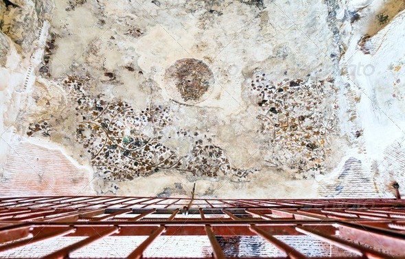 Ancient painted plaster on the ceiling of one of the caves in Little Petra - Stock Photo - Images