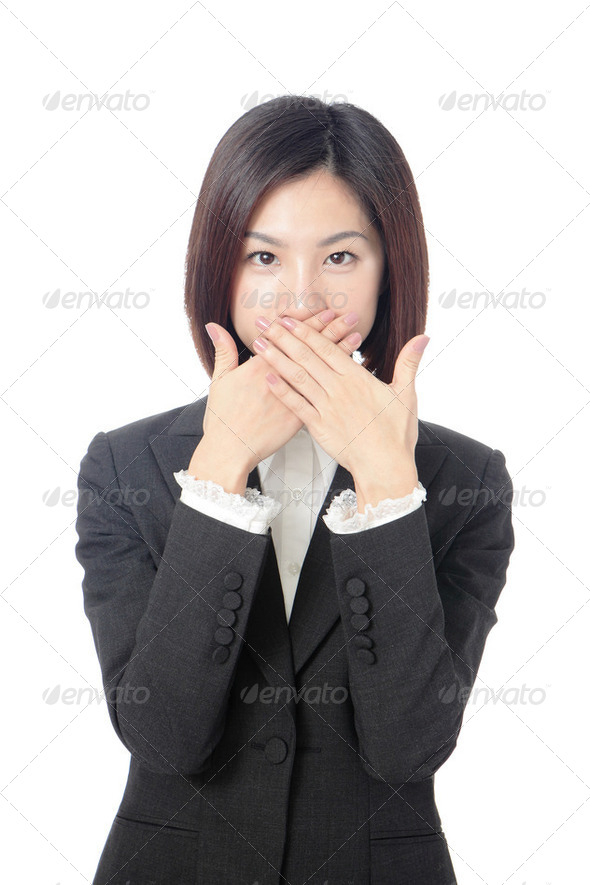 business woman covering with hands her mouth - Stock Photo - Images